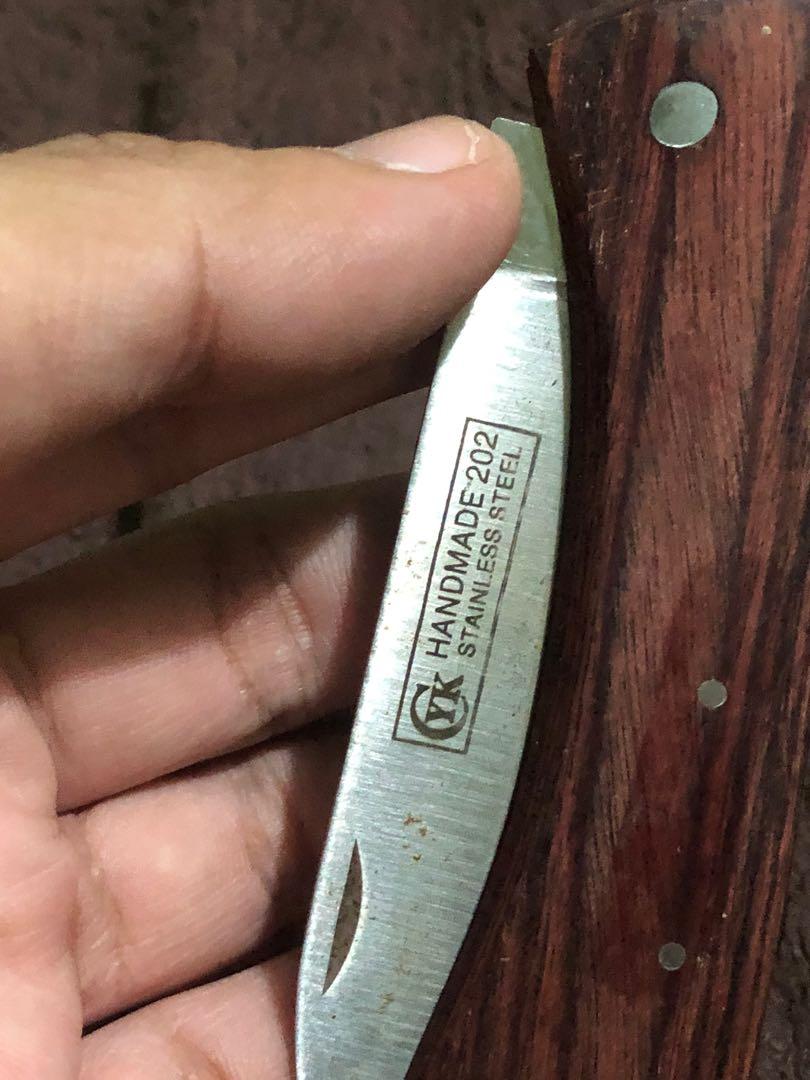 Old vintage wooden handle pocket knifeImage2